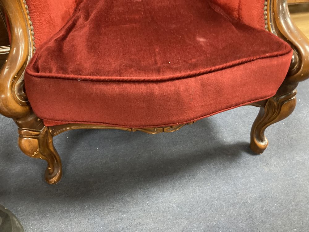 A reproduction Victorian style armchair